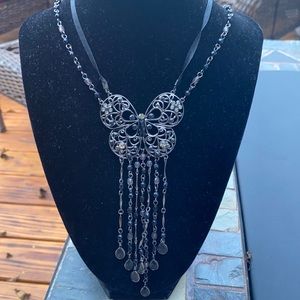Butterfly silver/black fringed statement necklace